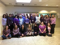 Faculty and staff wearing purple